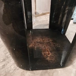 Sculptural Black Marble Sofa Side Table with Curved Dark Wood Panels and Open Architectural Base